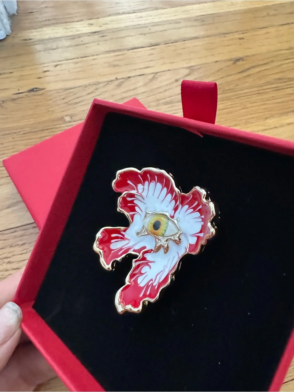 Uniqlo Red and White Enamel Eye Brooch with Gold Trim